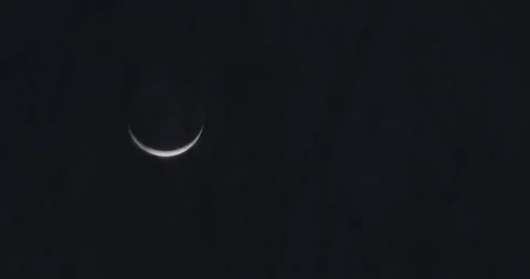 Waxing Crescent Moon with Earthshine in Deep Night Sky 库存影片 342834366