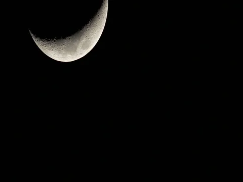 Waxing Crescent Moon. Twenty Three Percent Full. March Worm Moon. Stock Footage 73127182