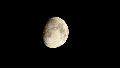 Waxing Gibbous Moon Moving in Night Sky Stock Footage