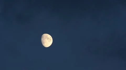 Waxing moon with moving clouds Stock Footage 12869642