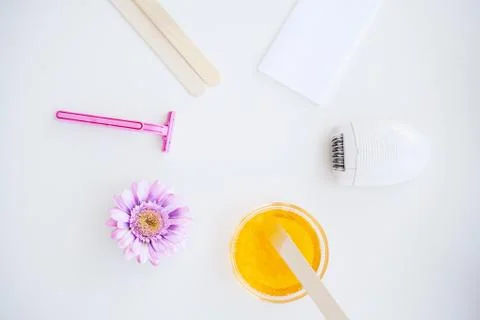Waxing. Set for Epilation Of different Means For Epilation on a White Background Stock Photos