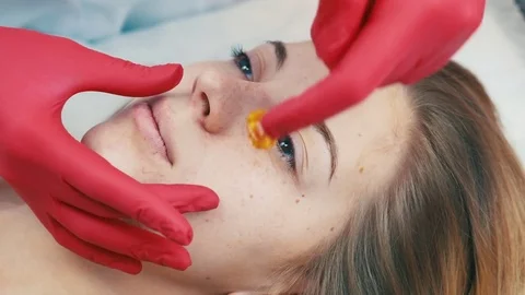 Waxing woman's mustache Video stock 81139588