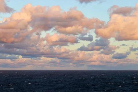 Way to Helsinki. Dramatic sunset clouds in the Baltic Sea view from the ferry Stock Photos
