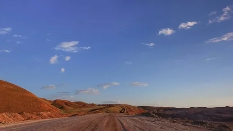 On the way to the quarry. Moving camera. On-coming tow truck with the bulldozer Stock Footage 73317131