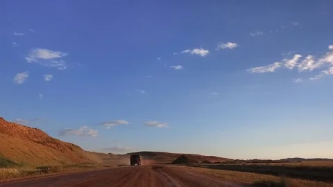 On the way to the quarry. Moving camera. On-coming truck with the ore Stock Footage 73373234