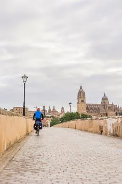 Way of st. James pilgrim. Active senior man travel bike cycling. Salamanca Stock Photos