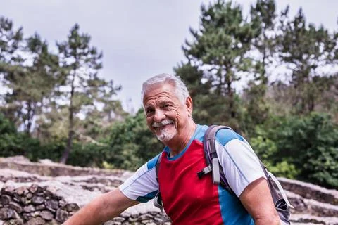 Way of St James Pilgrim, Elderly active man happy smile in countryside Galician Stock Photos