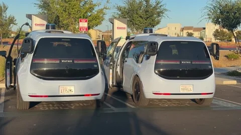 WAYMO DRIVERLESS CAR AUTONOMOUS ROBOTAXI IN SACRAMENTO CALIFORNIA Stock Footage 345620867
