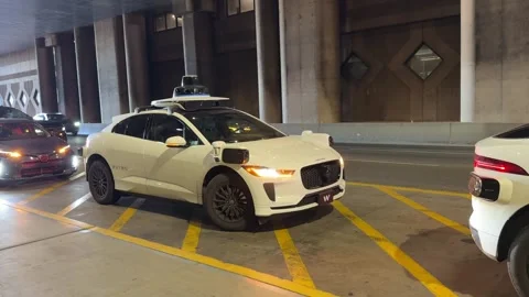 Waymo Self Driving Robotaxi at Phoenix airport Stock Footage 336700473
