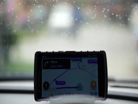 The waze app is used for roadmap guides. Stock Footage 84345876