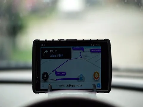 The waze app is used for roadmap guides. Stock Footage 84345899