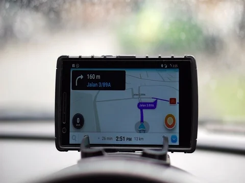 The waze app is used for roadmap guides. Stock Footage 84345992