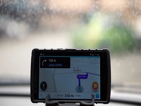 The waze app is used for roadmap guides. Stock Footage 84346033