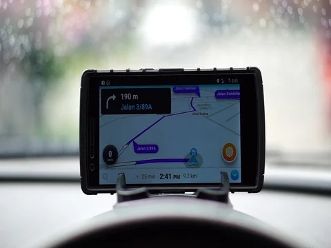 The waze app is used for roadmap guides. Stock Footage 84346102