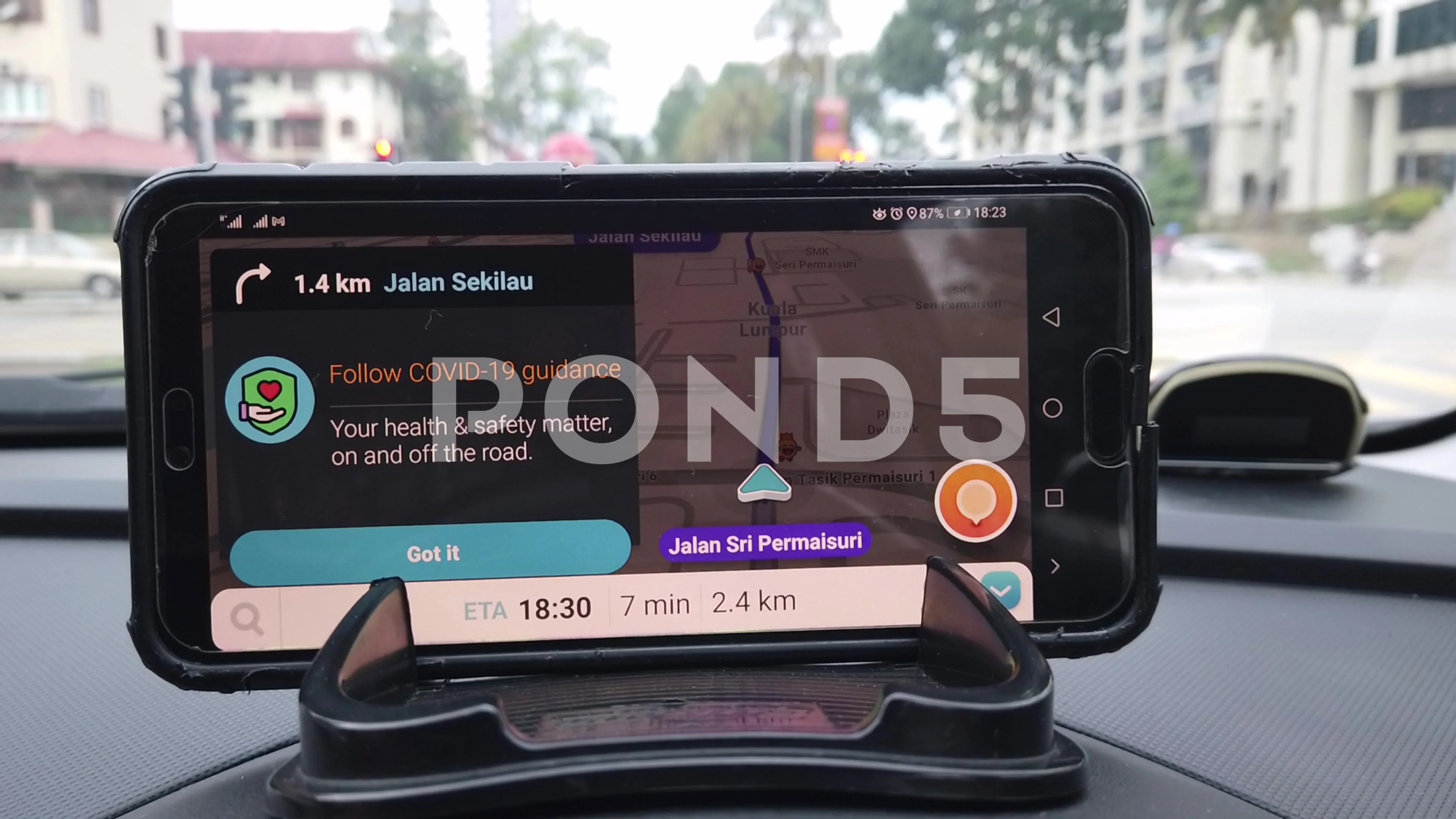 the Waze on Smartphone app on the car dashboard