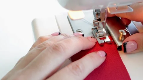 We align the magnetic limiter, taking into account the necessary seam allowance. Stock Footage 170157323