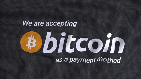 We are accepting bitcoin as a payment method dark flag waving Stock Footage 80863925