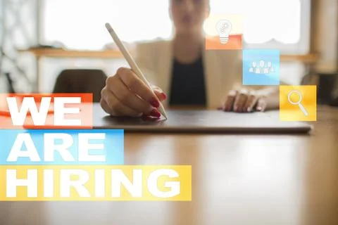 We are hiring text on virtual screen. Recruitment. HR. Human resources Stock-Fotos