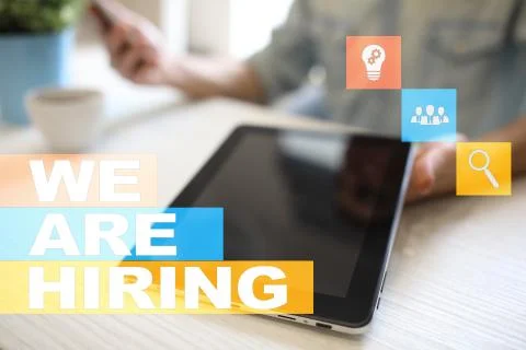 We are hiring text on virtual screen. Recruitment. HR. Human resources 库存照片