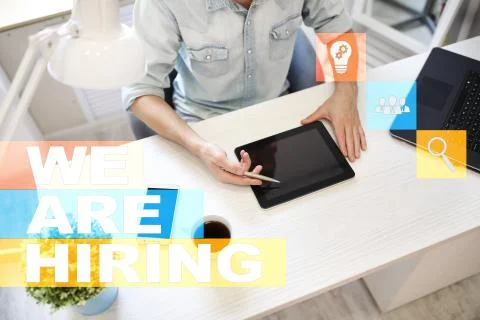 We are hiring text on virtual screen. Recruitment. HR. Human resources Stock-Fotos