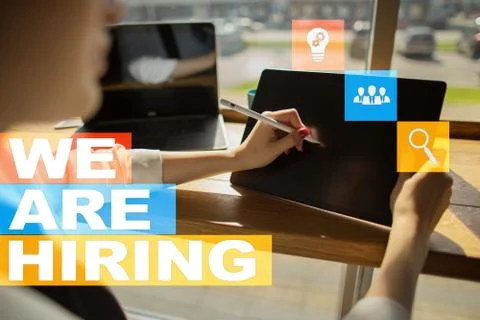 We are hiring text on virtual screen. Recruitment. HR. Human resources Stock Photos