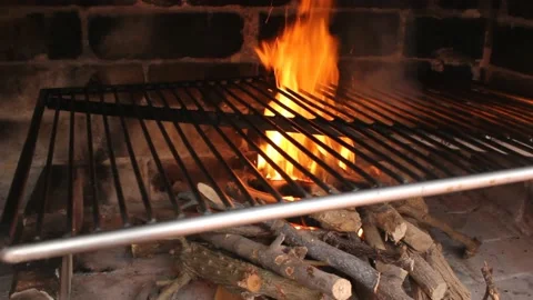 We are making the fire for the meat Stock Footage 239108686