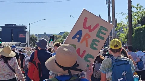 WE ARE ONE PLACARD AMONGST HUGE RALLY FOR YES VOTE IN REFERENDUM 2023 AUSTRALIA Stock Footage 250446232