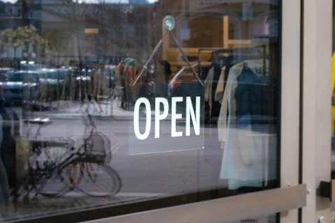 We are open sign on shop door - store window with open sign Stock Photos