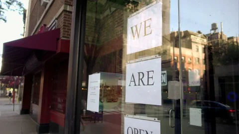 We are open sign storefront pandemic lockdown business hours coronavirus COVID 스톡 동영상 130040134