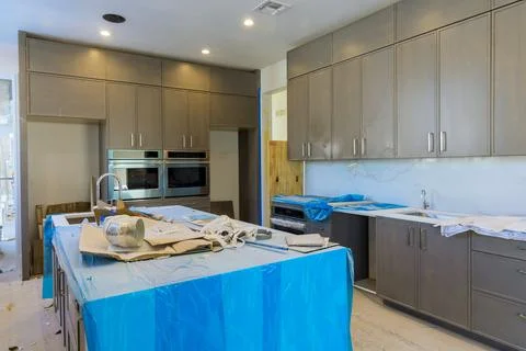 We are under construction on new home with a modular kitchen that consists of Stock Photos