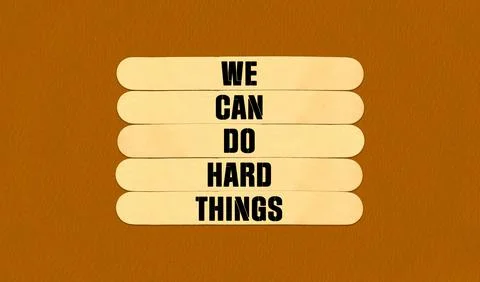 We Can Do Hard Things on beautiful wooden stick. Orange Chart Paper Background. Stock Illustration