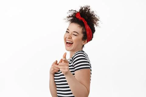 We can do it. Cheerful brunette woman feminst, women rights activist, pointing Foto stock