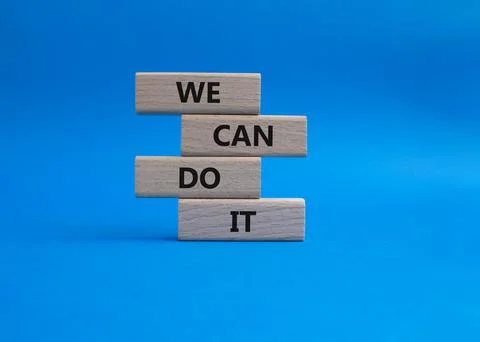 We can do it symbol. Concept words We can do it on wooden blocks. Beautiful.. Stock Photos