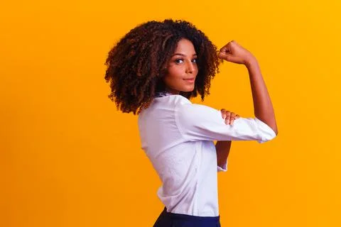We can do it. Woman's fist of female power. Woman victim of racism. Abuse at  Stock Photos