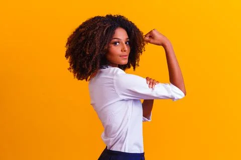We can do it. Woman's fist of female power. Woman victim of racism. Abuse at  Stock Photos