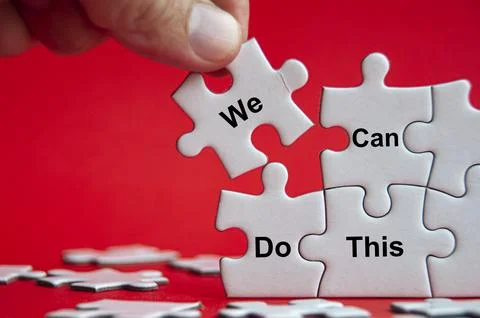 We can do this text on jigsaw with one hand holding a missing jigsaw pieces.. Stock Photos