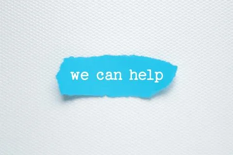 WE CAN HELP. text on white background blue torn paper Stock Photos