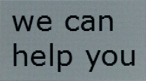 "we can help you" typed on a computer screen in close-up Stock Footage 55484327