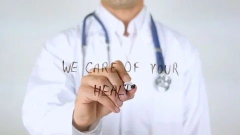 We Care of your Health, Doctor Writing on Glass Stock Footage