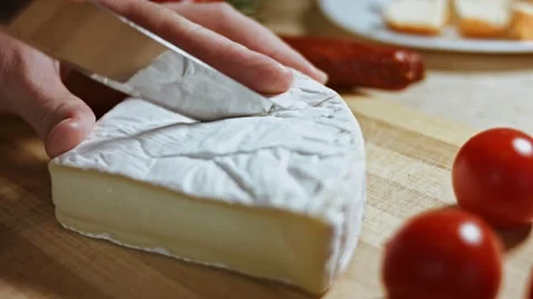 We cut Brie cheese. Cristmas disposition. Stock Footage 144467428