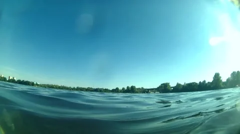 We dive under the water in the river Stock Footage 62822618