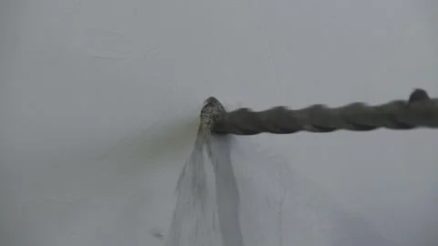 We drill the wall during the renovation Stock Footage 156814327