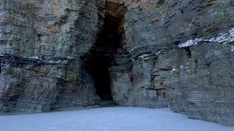 We enter the Playa das Catedrales cave Stockbeeldmateriaal 259160790