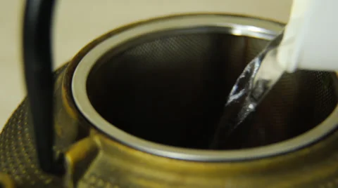 We fill in tea with boiled water Stock Footage 30643117