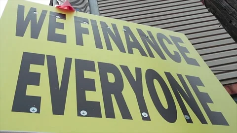 We finance everyone caption writing text sign in black capital letters on yellow Stock Footage 247749204