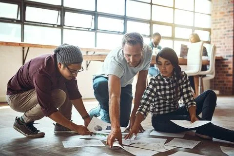 We find and fix problems together. a team of entrepreneurs collaborating and Stock Photos