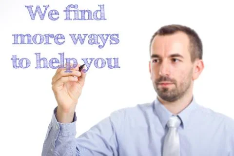 We find more ways to help you - Young businessman writing blue text on tran.. Stock Photos