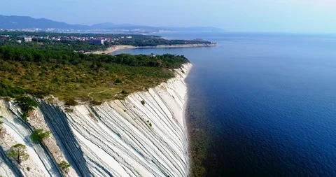 We fly over the rocks of the black sea coast to the Blue Bay, the resort of Stock Footage 128545875
