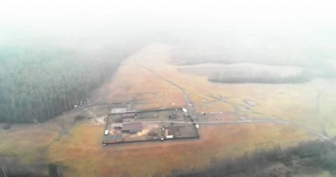 We fly on a quadrocopter into the clouds above the farm Stock Footage 169494320