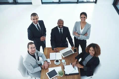 We get the job done efficiently. High angle shot of a group of businesspeople Stock Photos